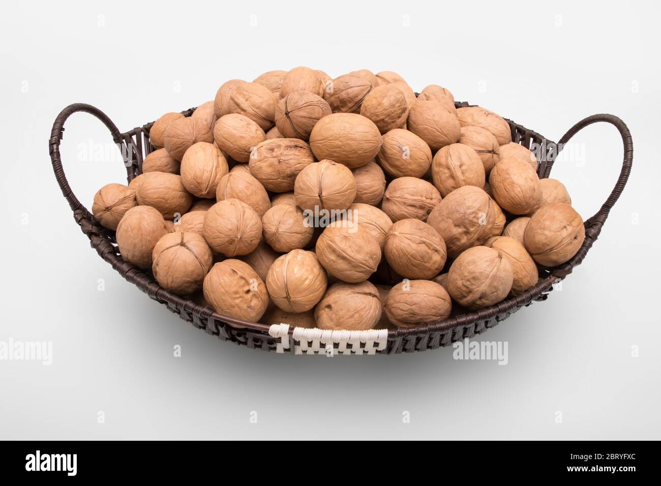 Walnuts in the shell - Juglans Regia Stock Photo