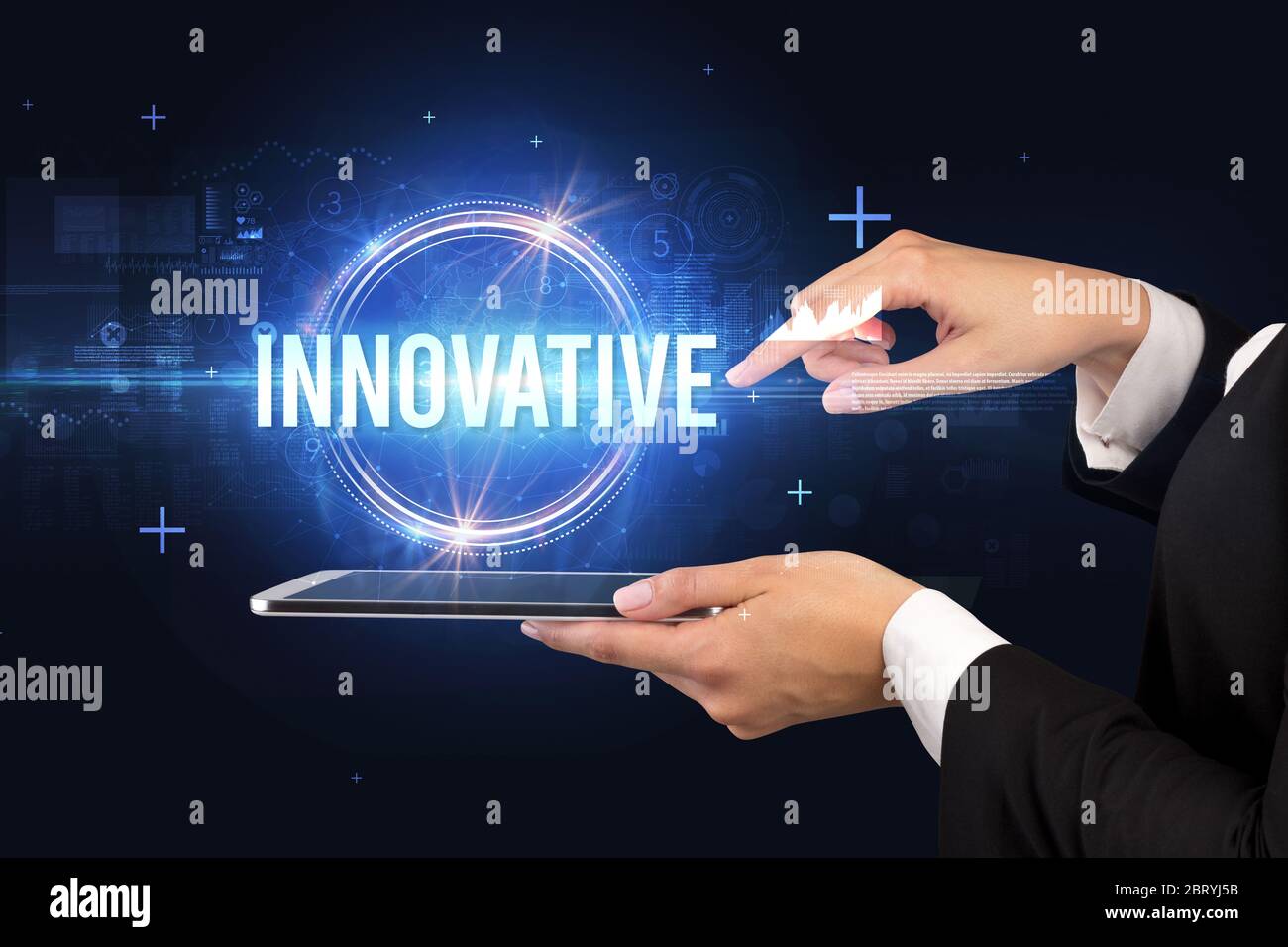 Close-up of a touchscreen with INNOVATIVE inscription, new technology ...