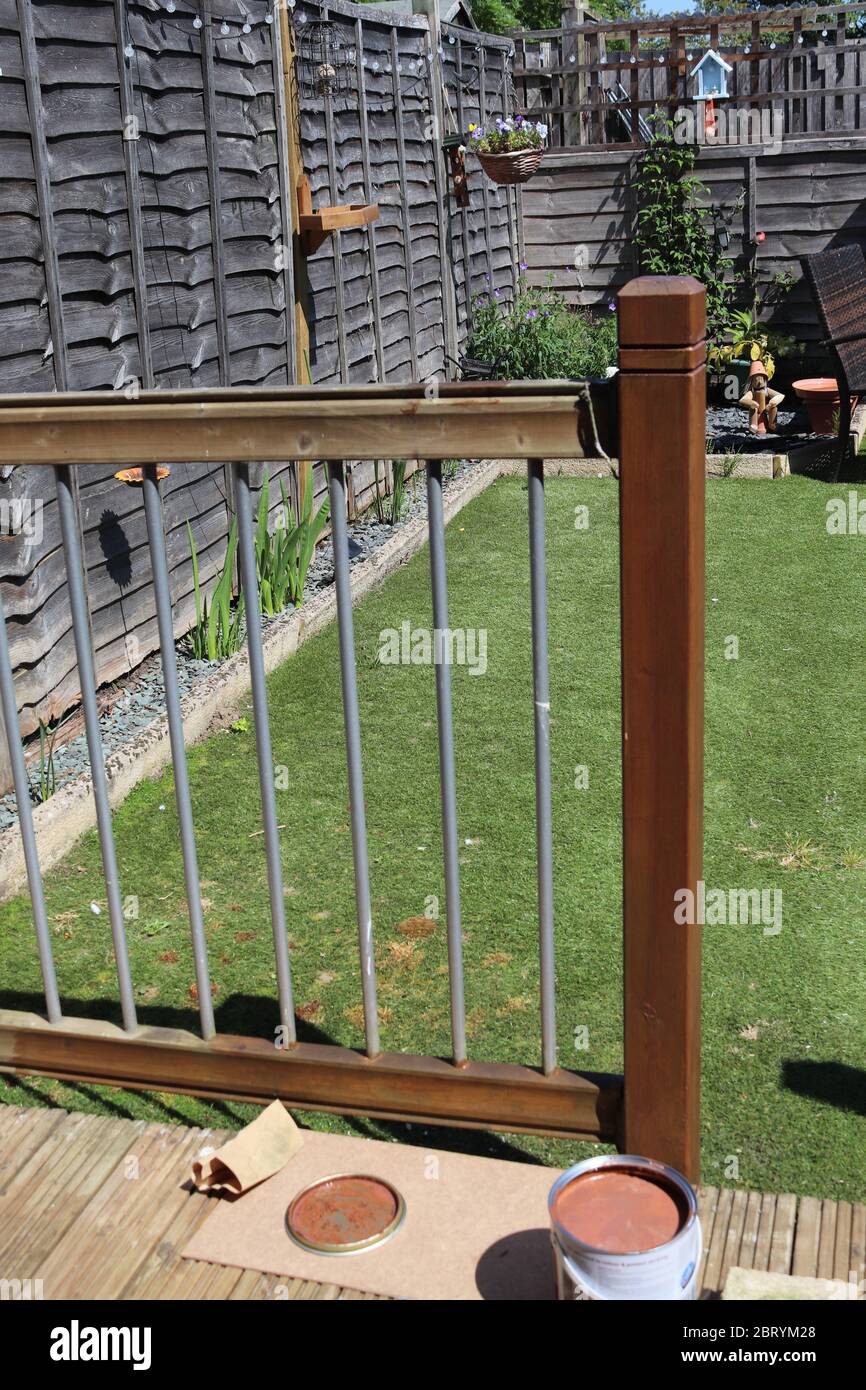 Painted and staining wooden decking area rails Stock Photo Alamy