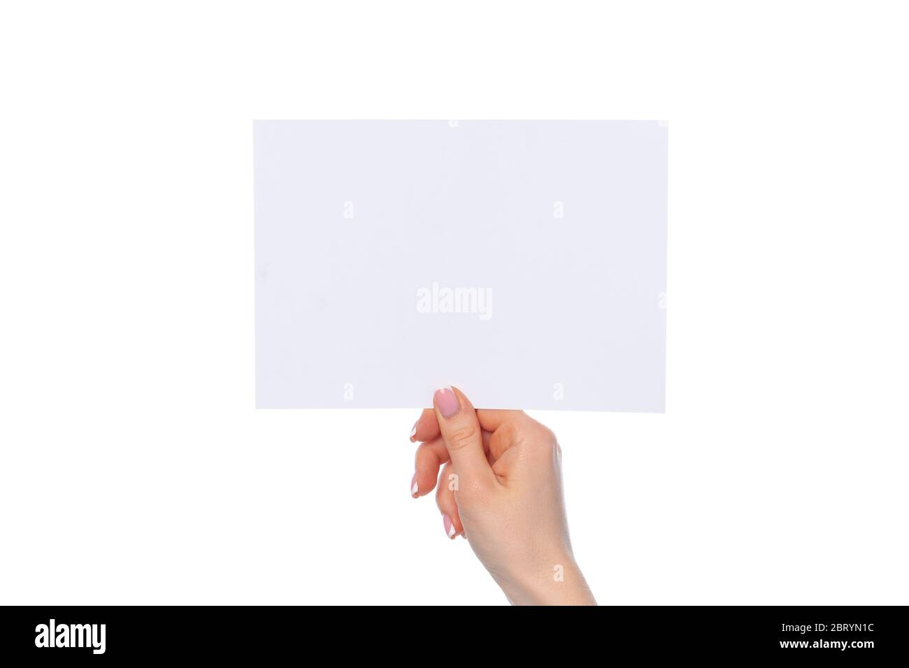 Female hand holding blank white sheet of paper isolated on white Stock ...