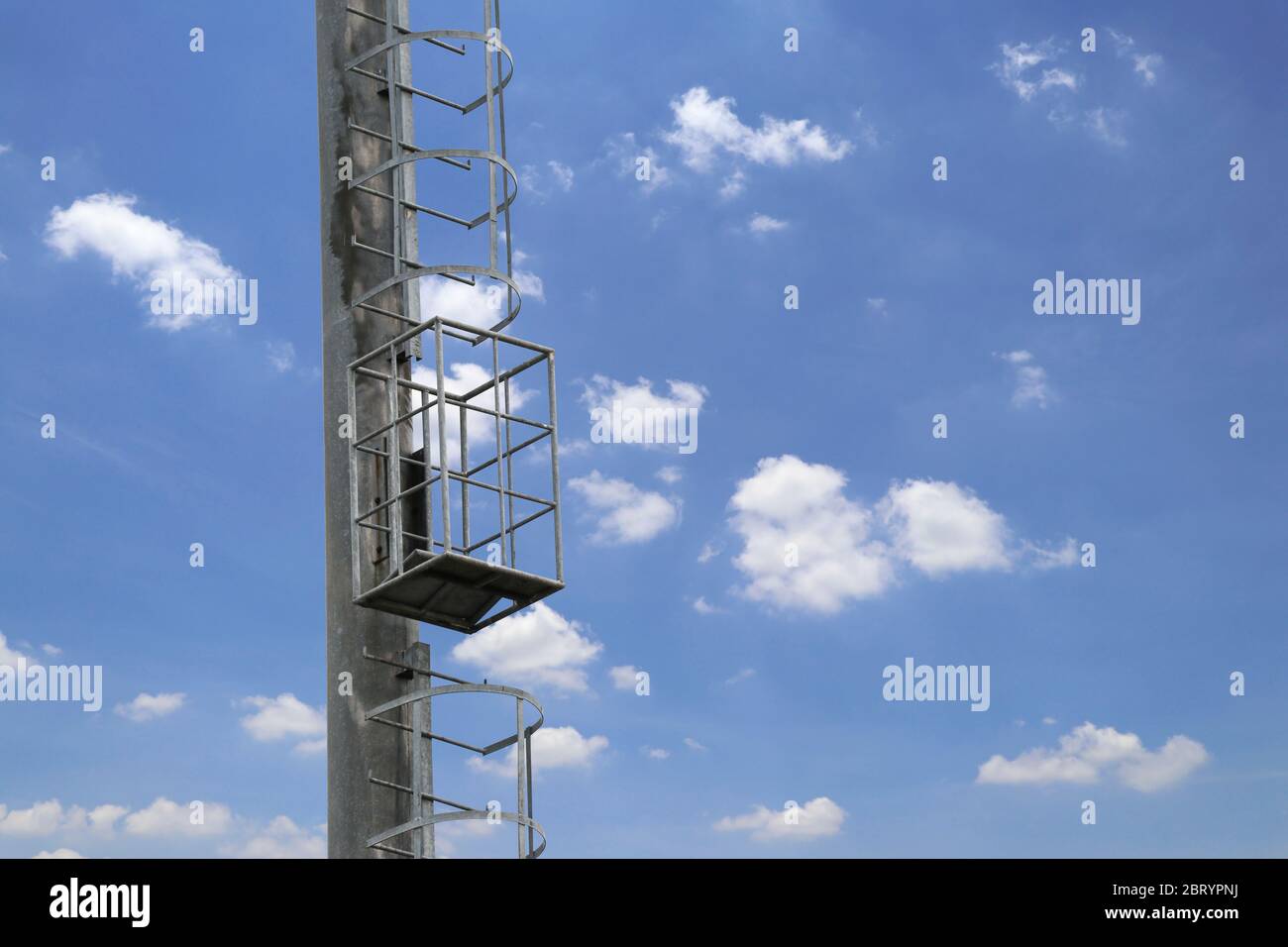 Ladder for climbing onto light posts for maintenance and landing on the