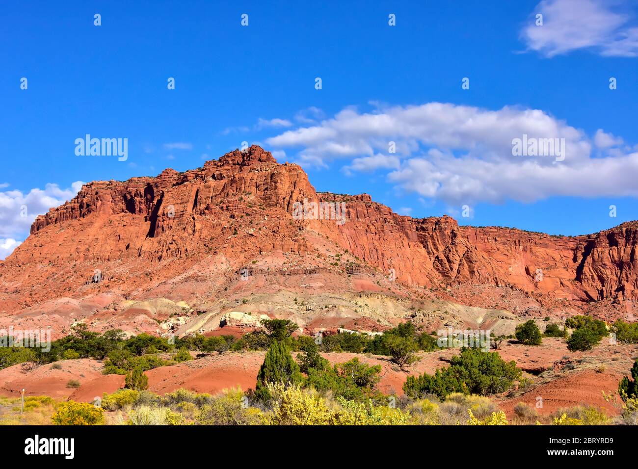 Red rock formations against a blue sky at Capitol Reef National Park ...