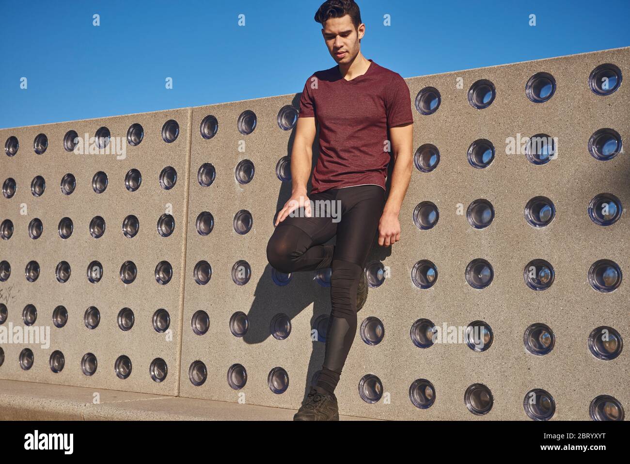In front of concrete wall hi-res stock photography and images - Alamy