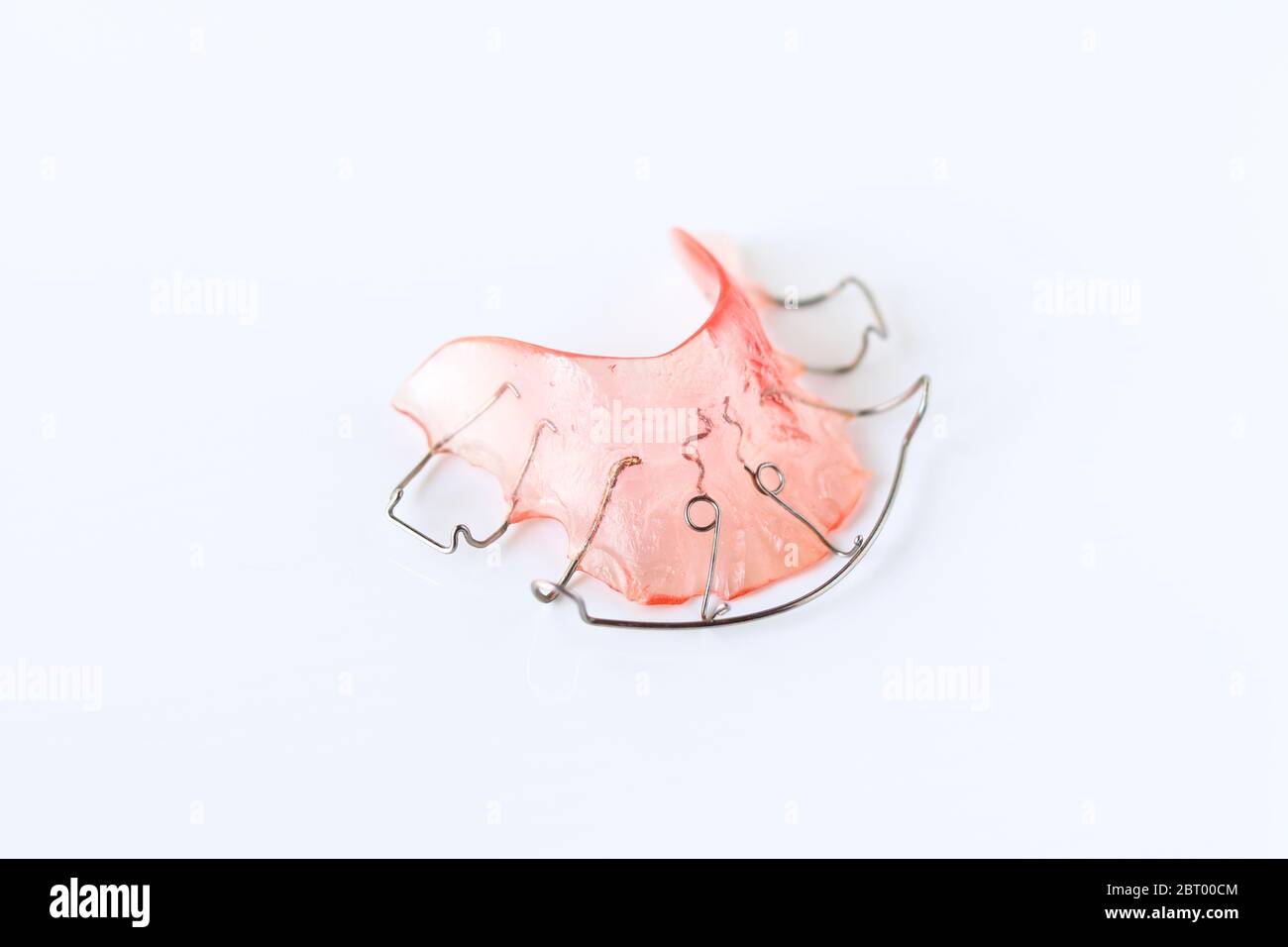 Pink retainers on white background. Retainers are important after