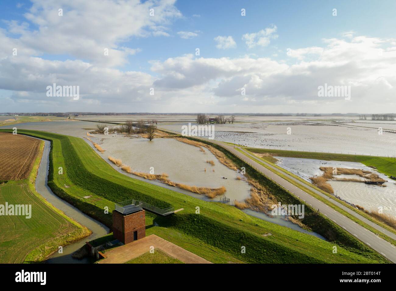 Aerial view of Wadden Sea and a road along a dyke in Friesland, The Netherlands. Stock Photo