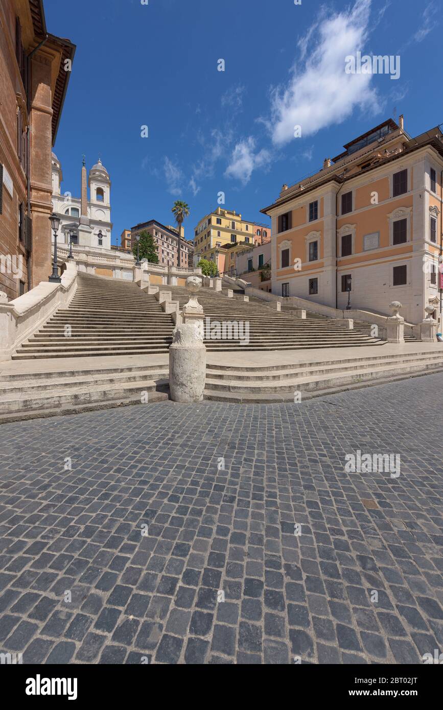 Rome, Italy - 19 May 2020: The popular Spanish Steps tourist spot appears empty in the middle of the day, as the usual traveller crowds have not yet r Stock Photo