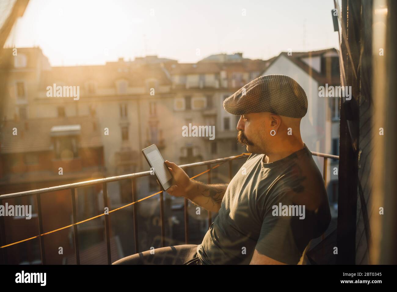 Man Wearing Flat Cap Using High Resolution Stock Photography and Images ...