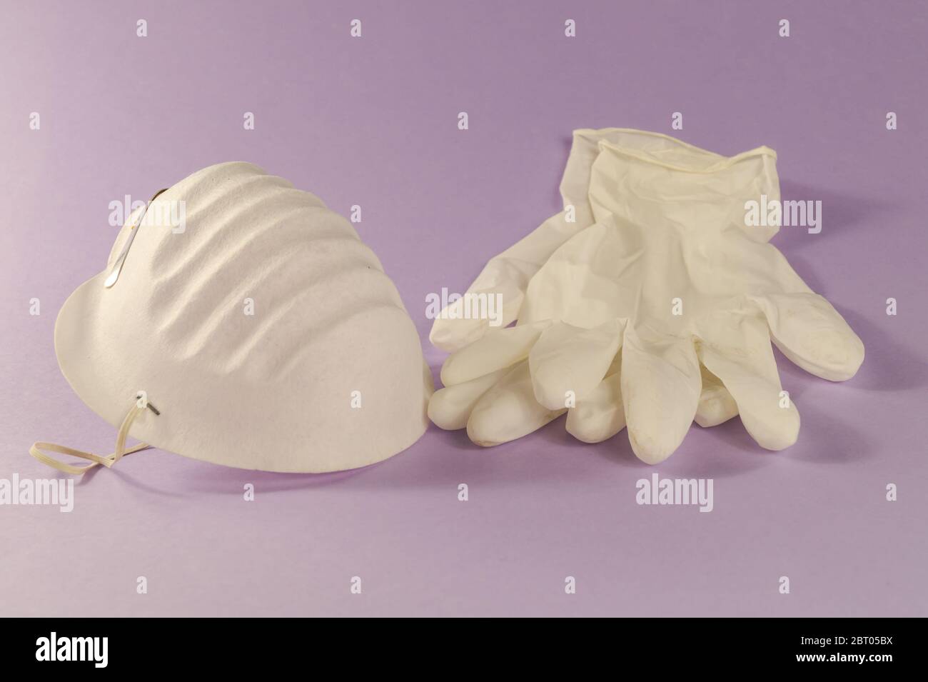 Blue medical latex gloves hi-res stock photography and images - Alamy