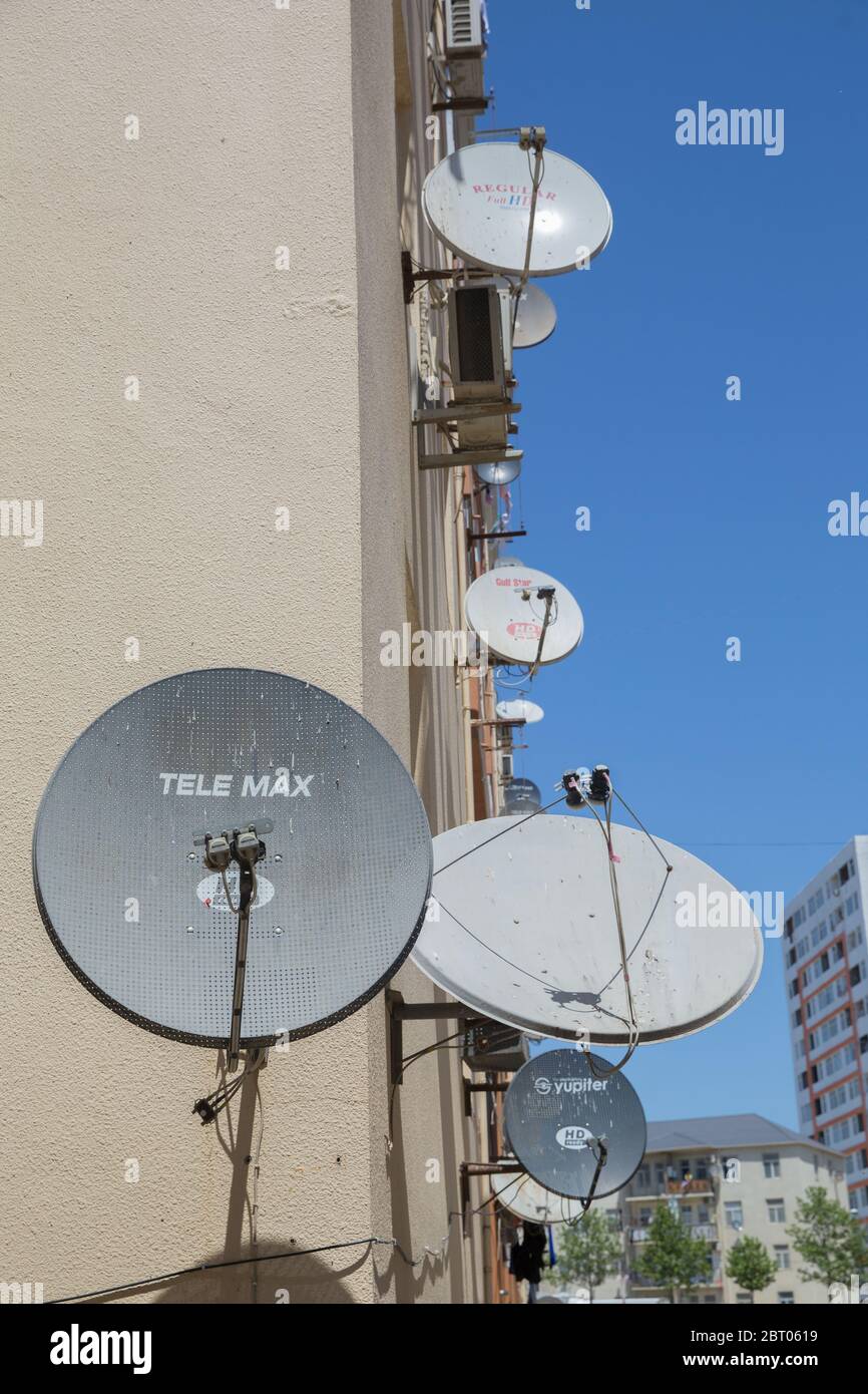 Satellite Dishes On The Old House Satellite Tv On The Wall Of A Multistory Building Satellite Dish Antennas A Bird Sit At The Satellite Dish With Stock Photo Alamy