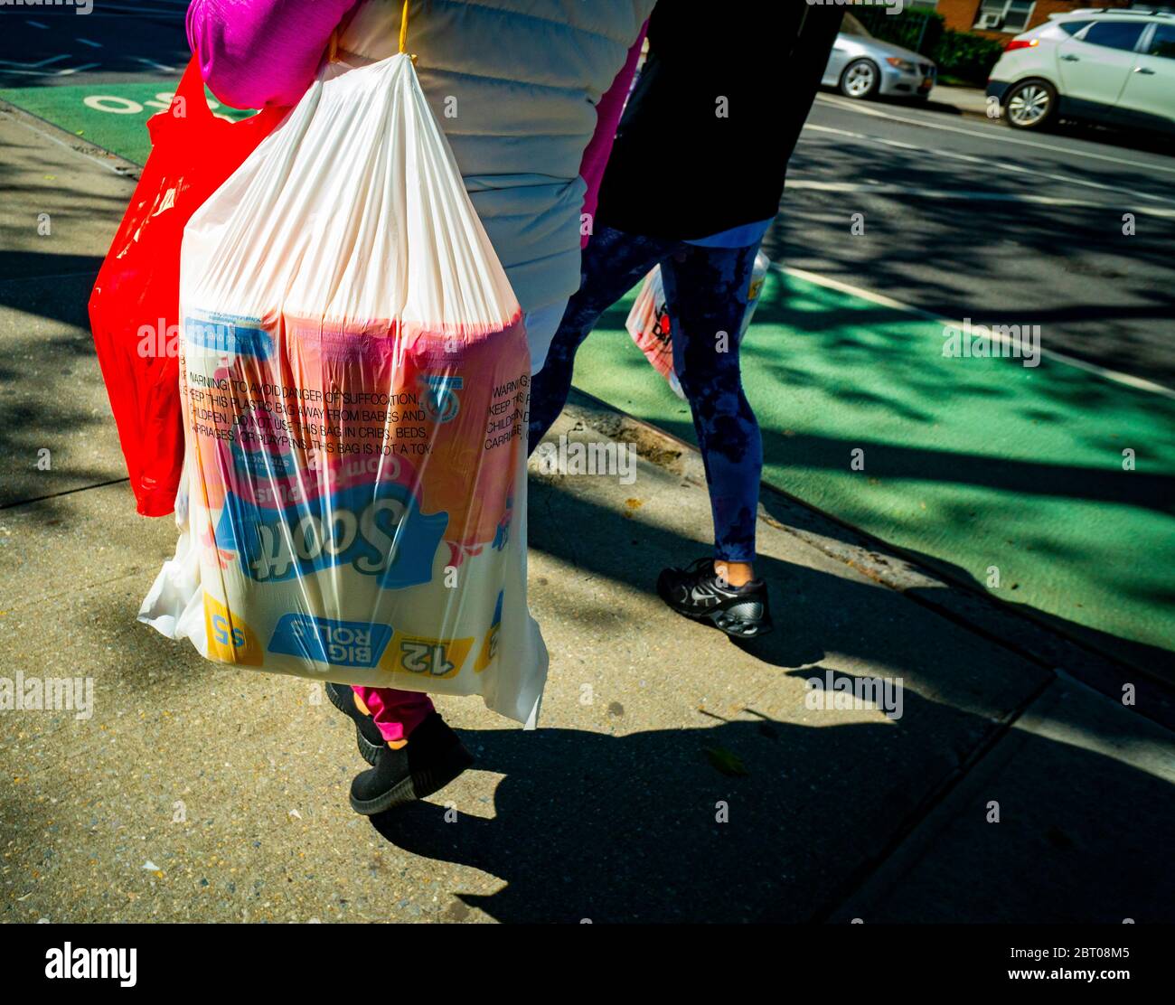 Shoppers with their supply of toilet paper in Chelsea in New York on Thursday, May 14, 2020. (© Richard B. Levine) Stock Photo