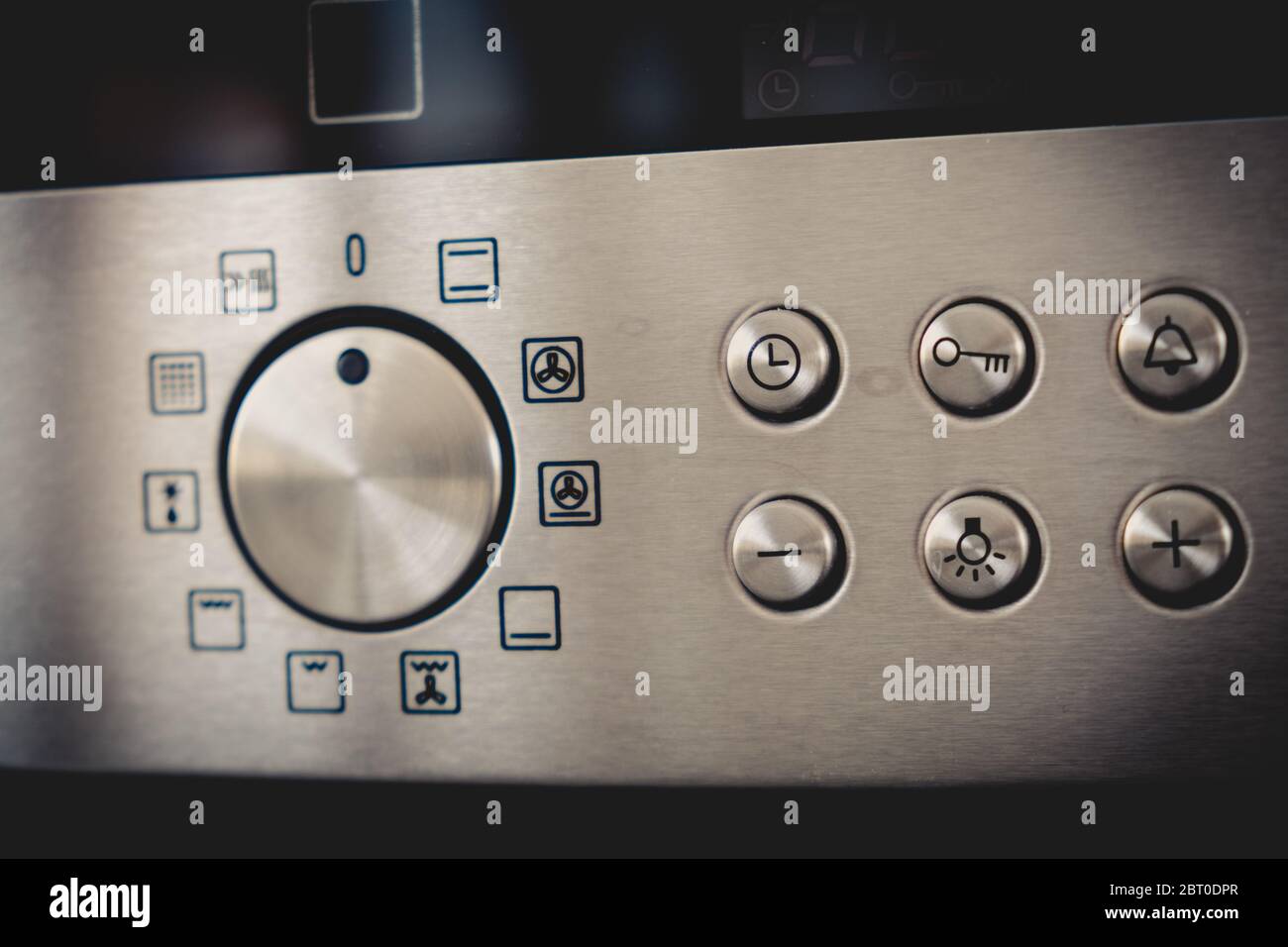 Kitchen oven stainless steel panel with buttons and knobs Stock Photo