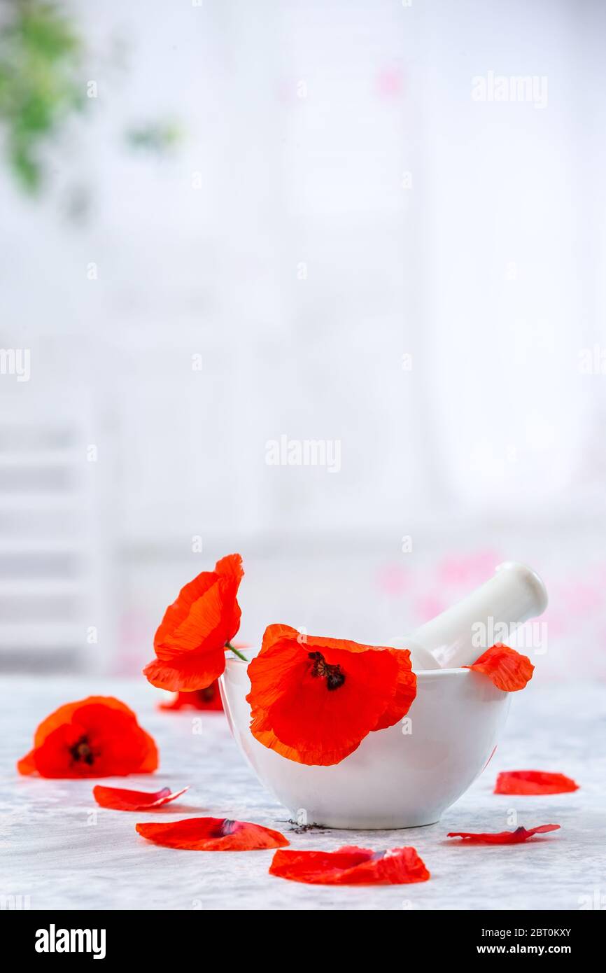 Life style for alternative medicine with red poppy flowers. Stock Photo