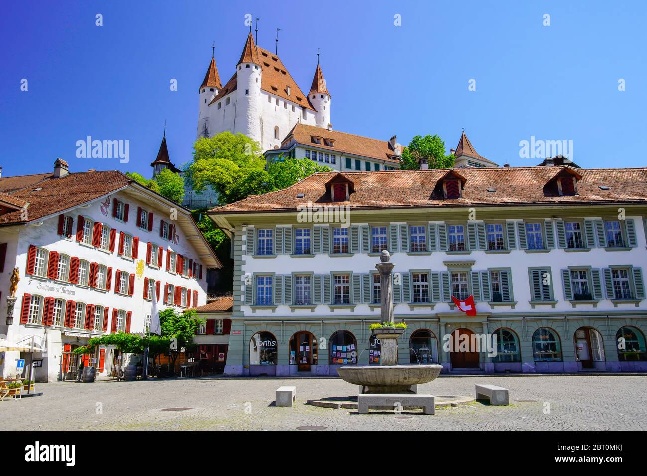 View of the medieval castle high above the old town of Thun was built in the 12th century. Bern canton, Switzerland. Stock Photo