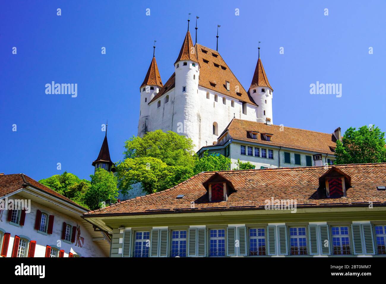 View of the medieval castle high above the old town of Thun was built in the 12th century. Bern canton, Switzerland. Stock Photo