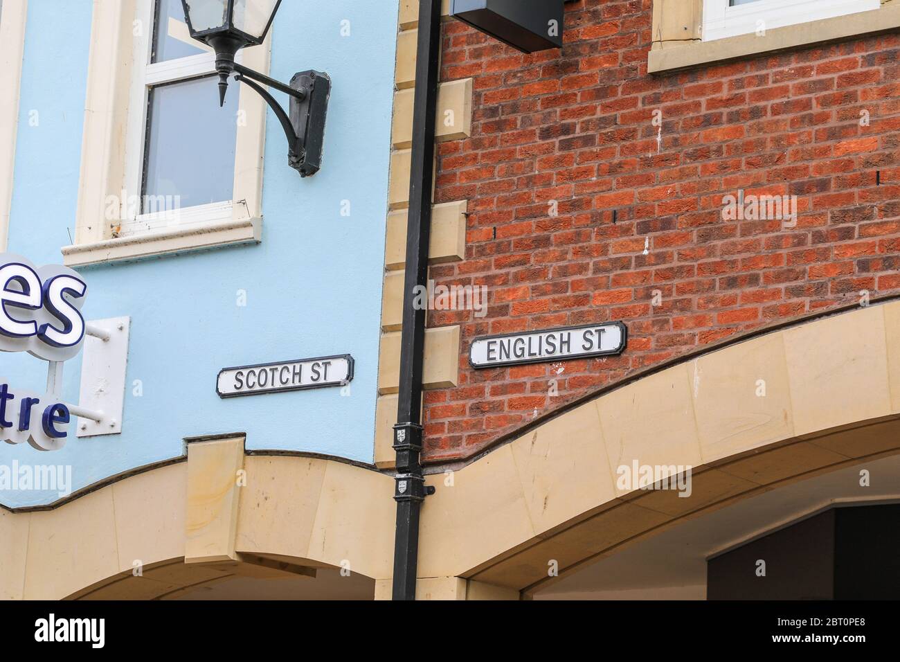 Street signs saying 'Scotch Street' and 'English Street', Carlisle, Cumbria, England, UK Stock Photo