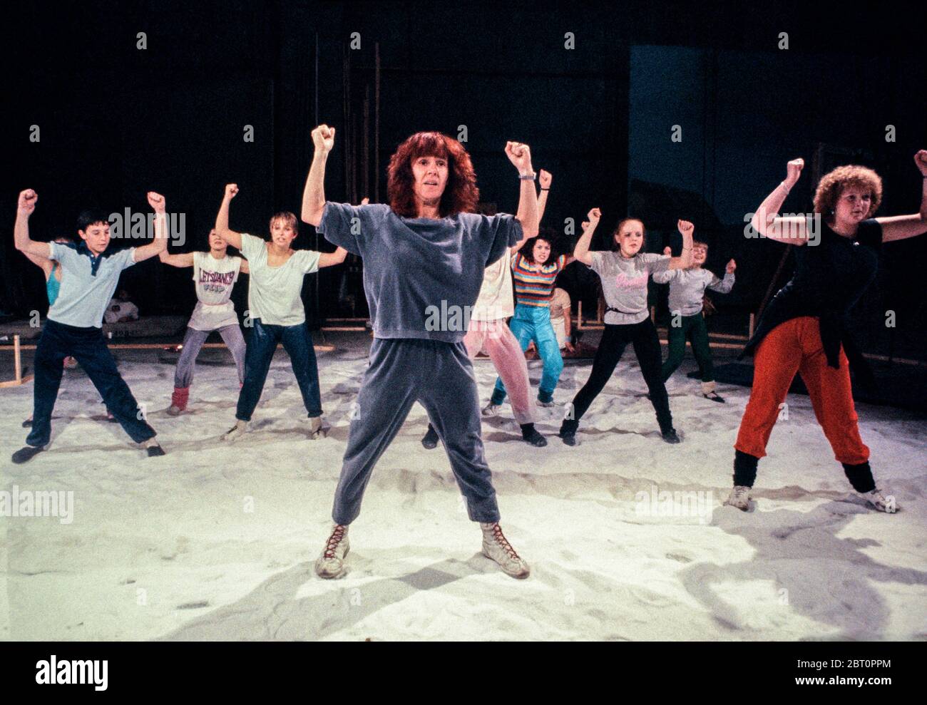 Arlene Phillips choreographer director of Hot Gossip rehearsing a childrens dance troupe for the film Legend 1984 Stock Photo