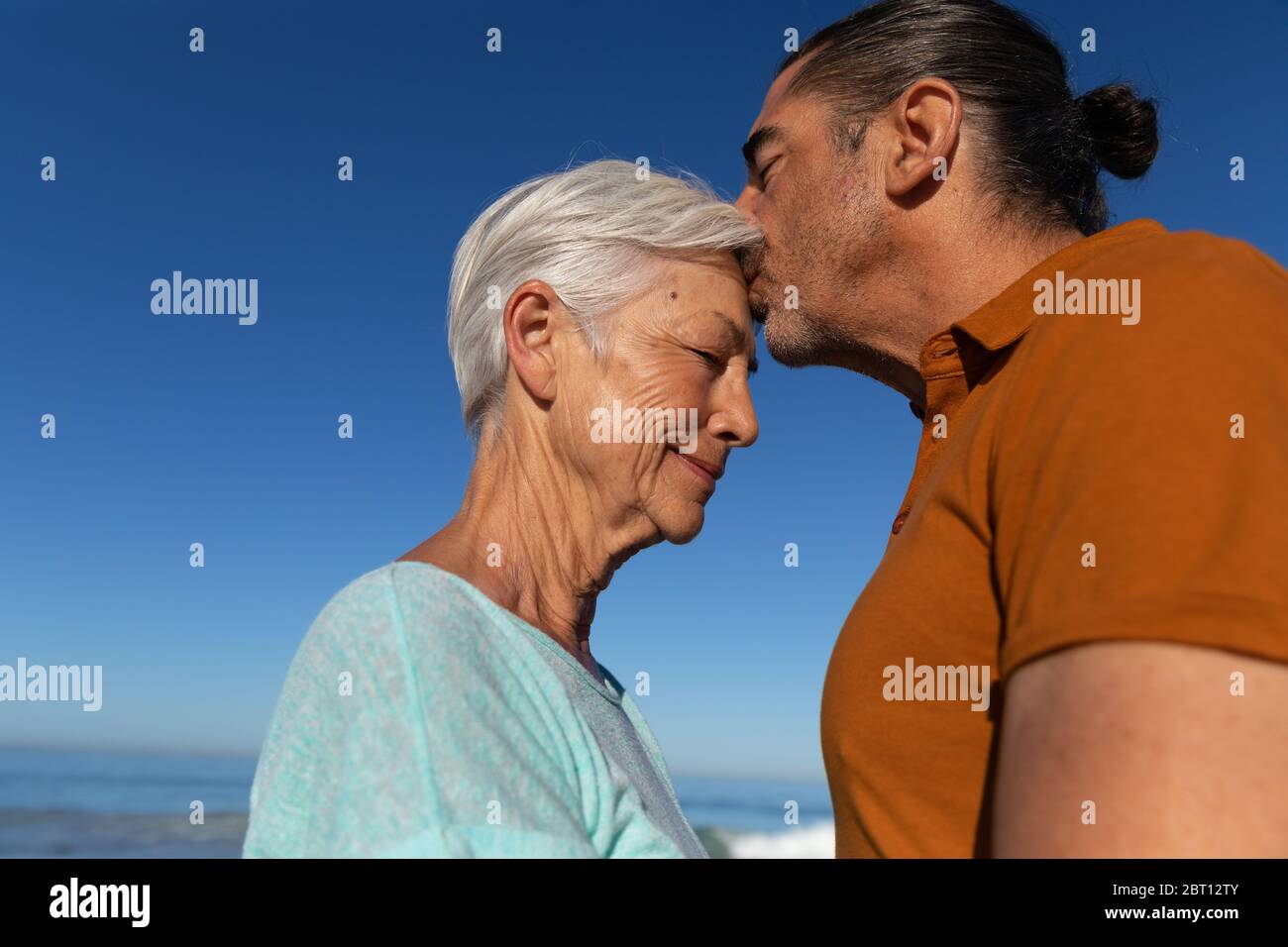 Senior Caucasian couple enjoying time at the beach Stock Photo