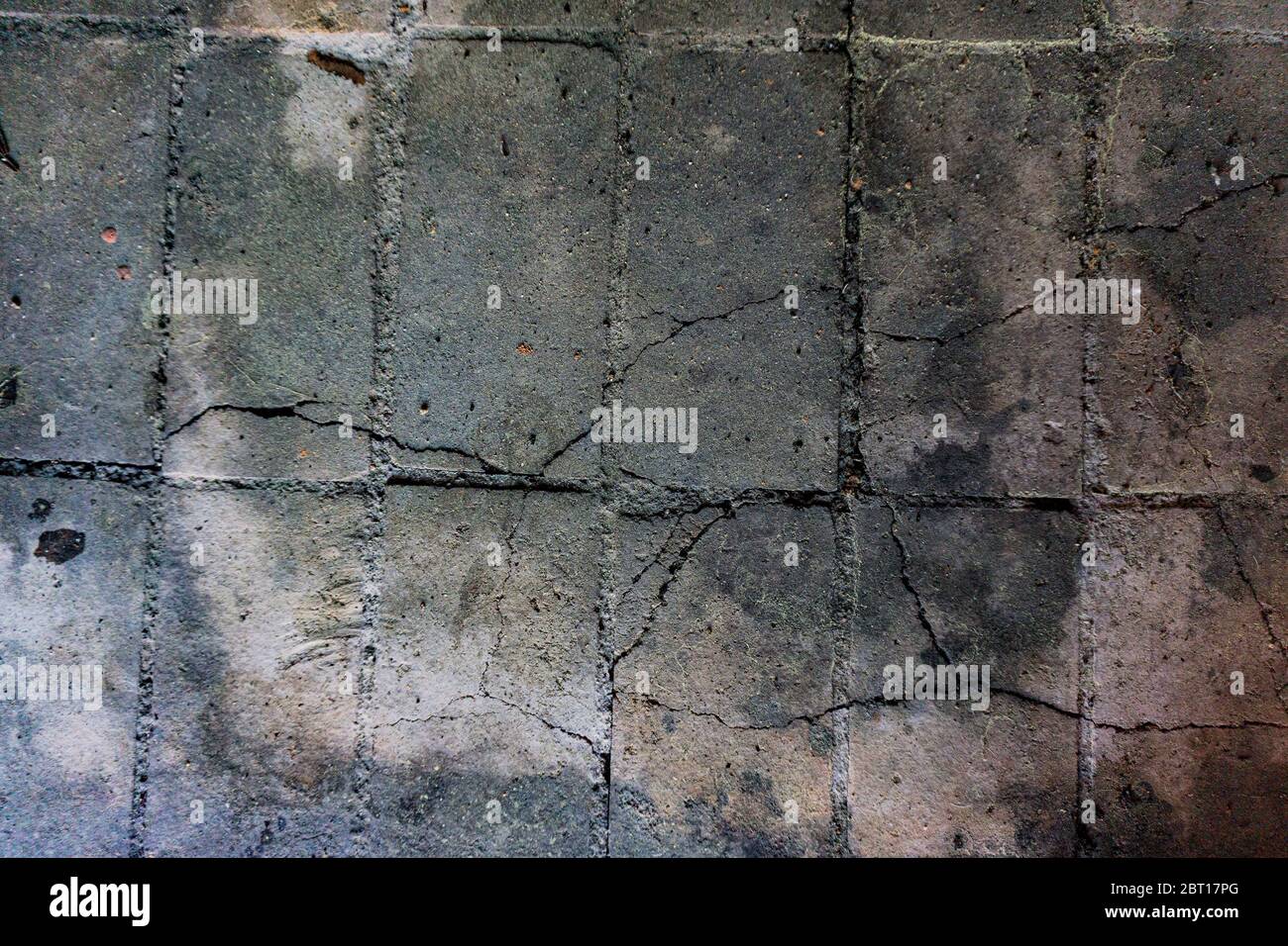 old stones texture on burned wall Stock Photo