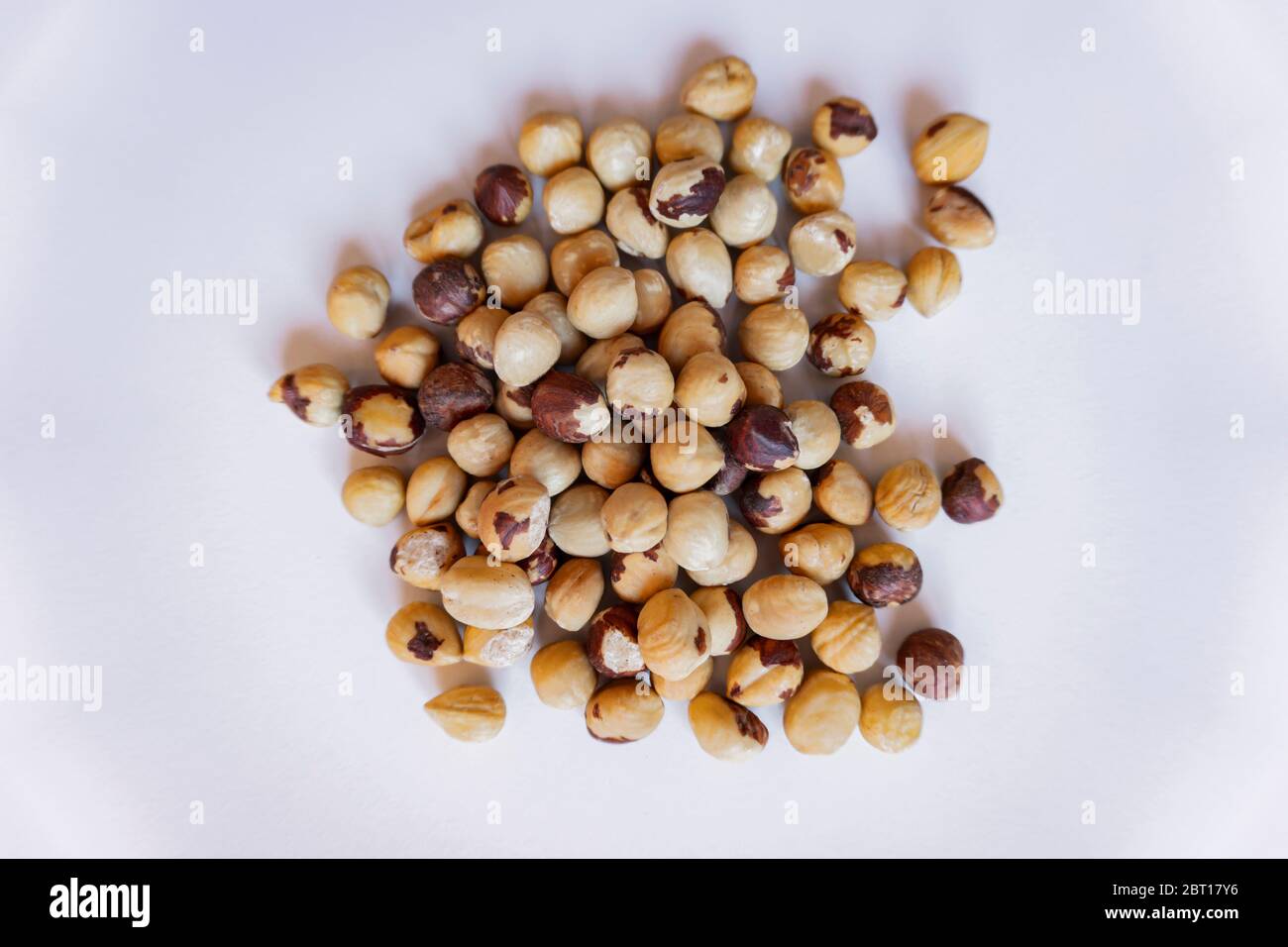hazelnuts isolated from dry fruits pot Stock Photo