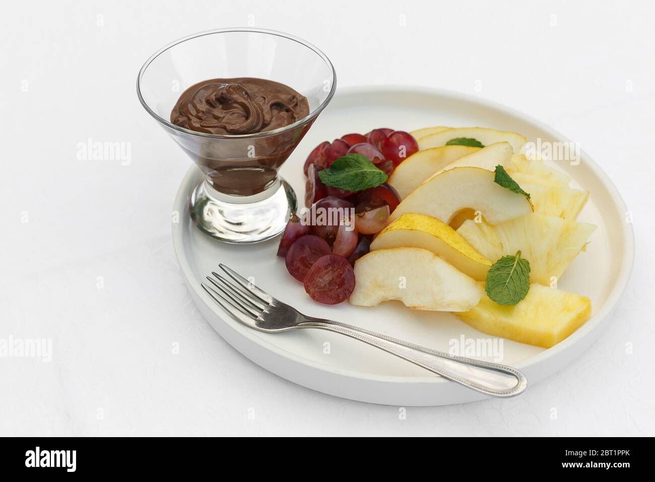 Mousse au Chocolat with fruits on white background Stock Photo - Alamy
