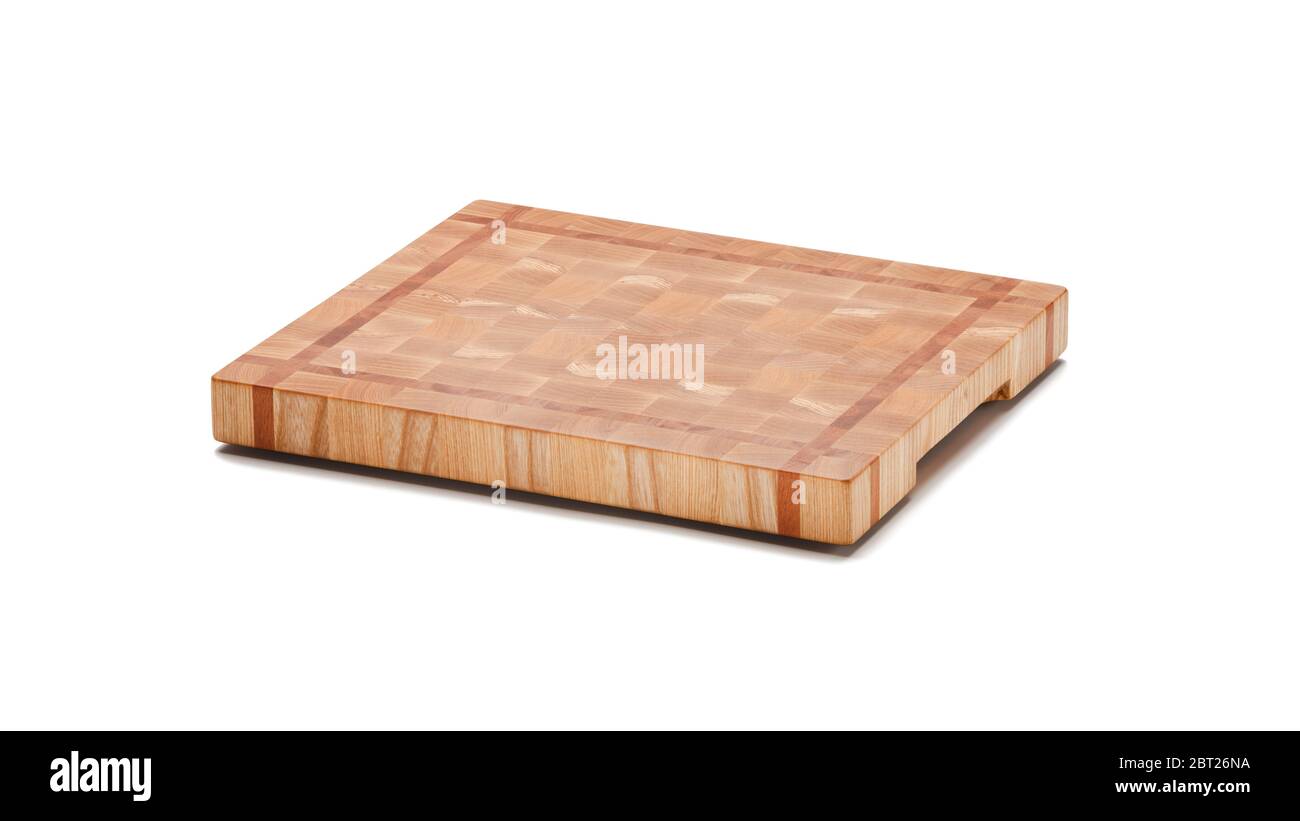 Cutting Board. Wooden end grain block cutting board isolated on white background. Full depth of field. Stock Photo