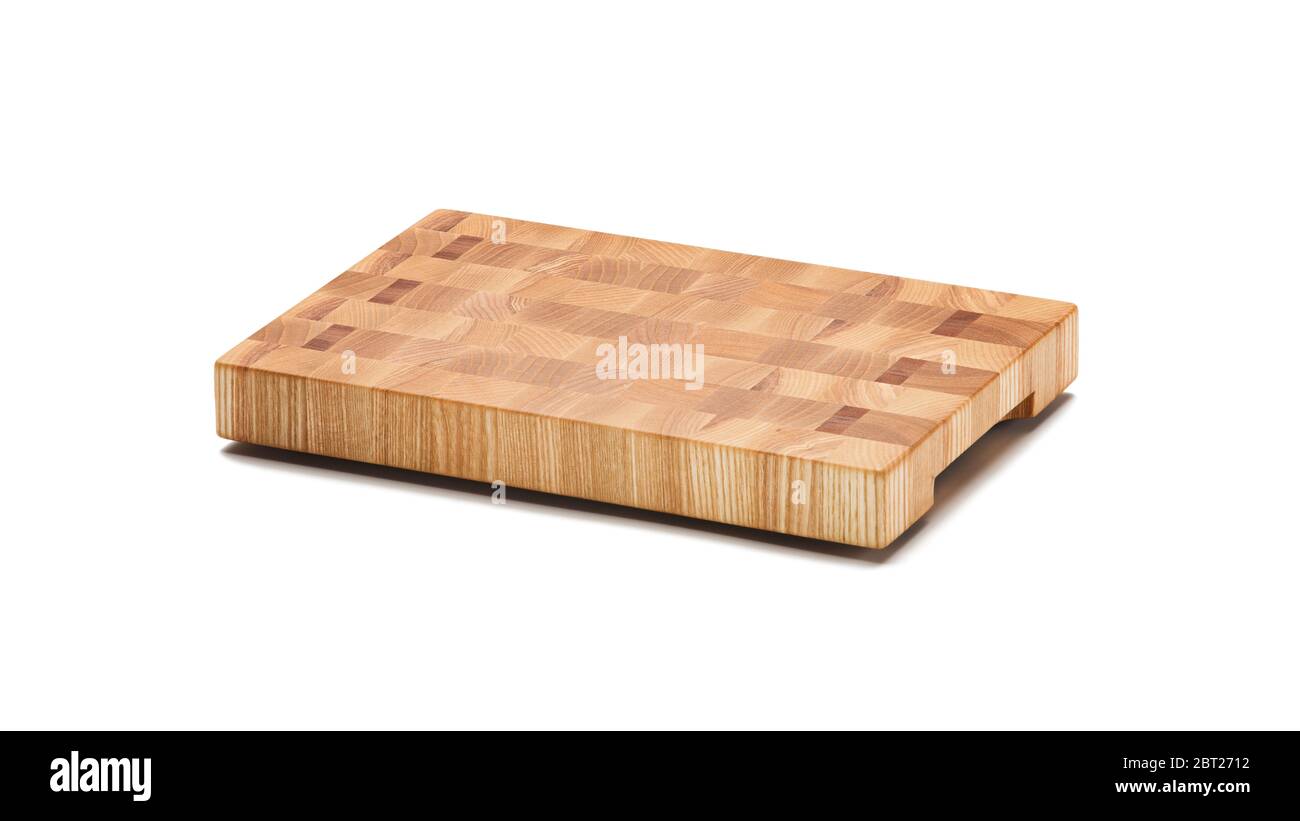 Premium cutting board. Butcher block isolated on white background. Full depth of field. Stock Photo