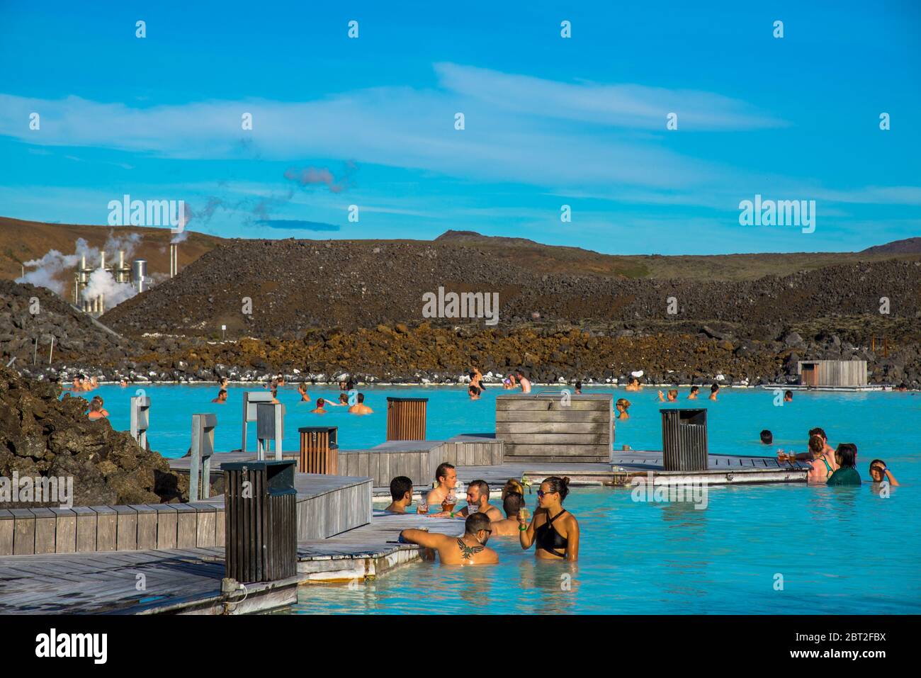 people at geothermal warm pool Blue Lagoon in Iceland Stock Photo