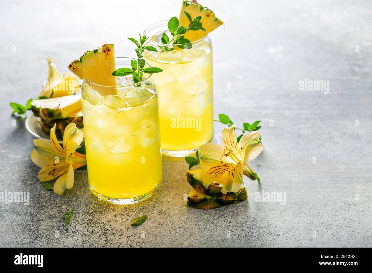 Tropical pineapple cocktail, refreshing summer drink Stock Photo - Alamy