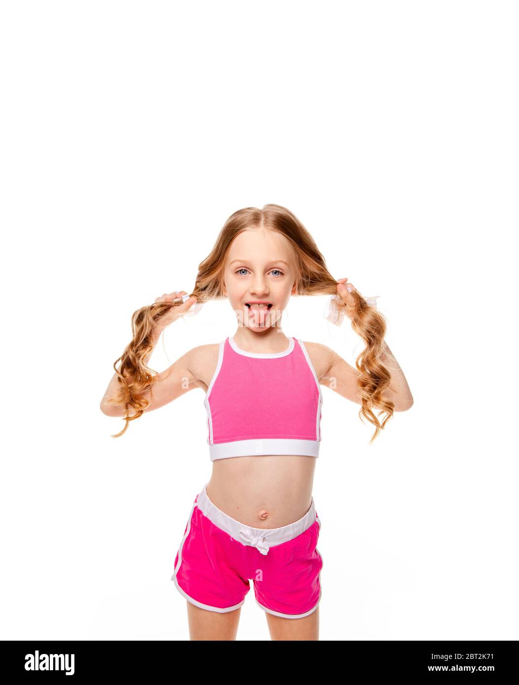 funny girl in a pink top shows tongue Stock Photo - Alamy funny girl in a pink top shows tongue Stock Photo - Alamy