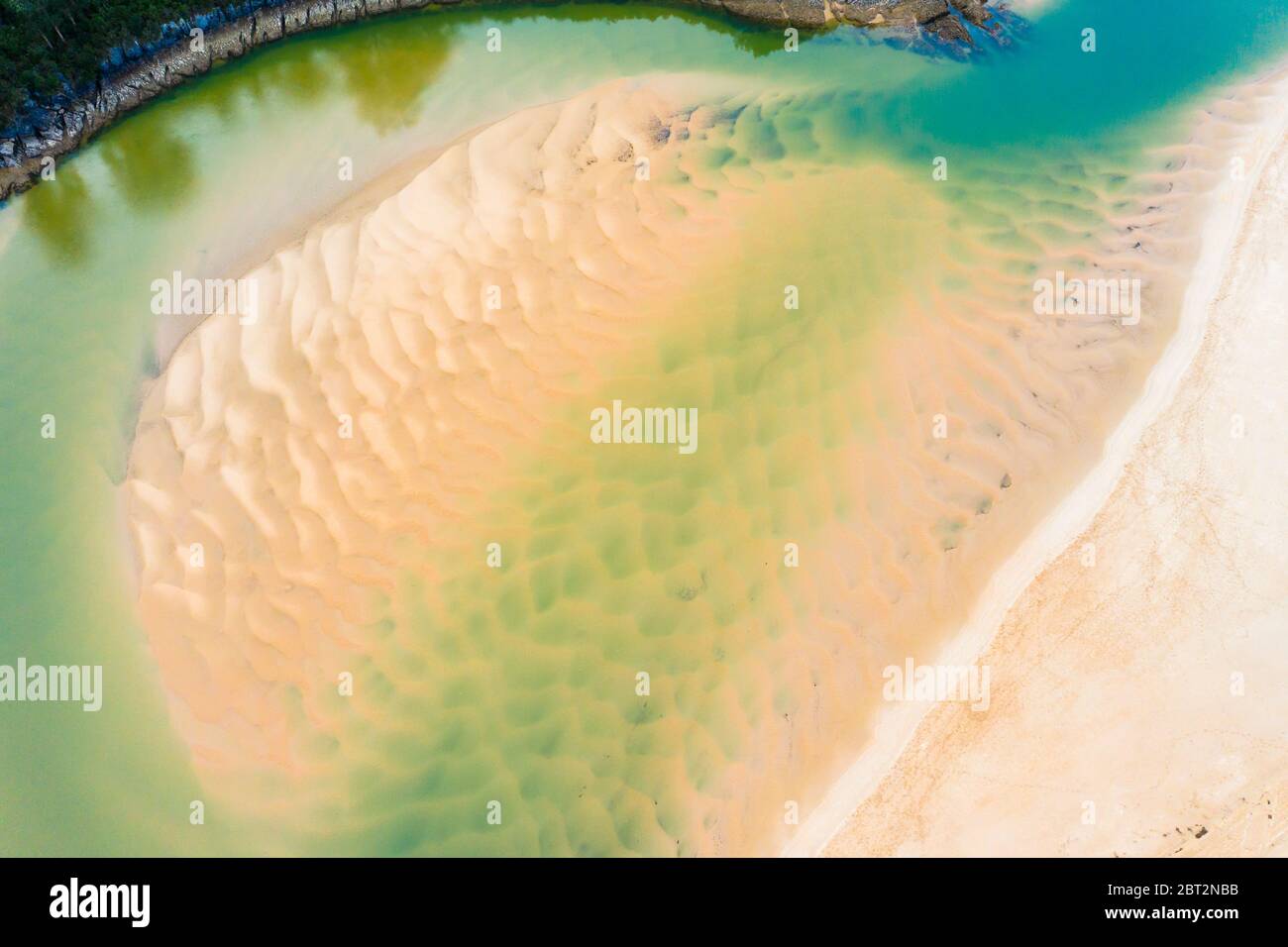 Sandy sediments in low tide in a river close to the sea. Stock Photo