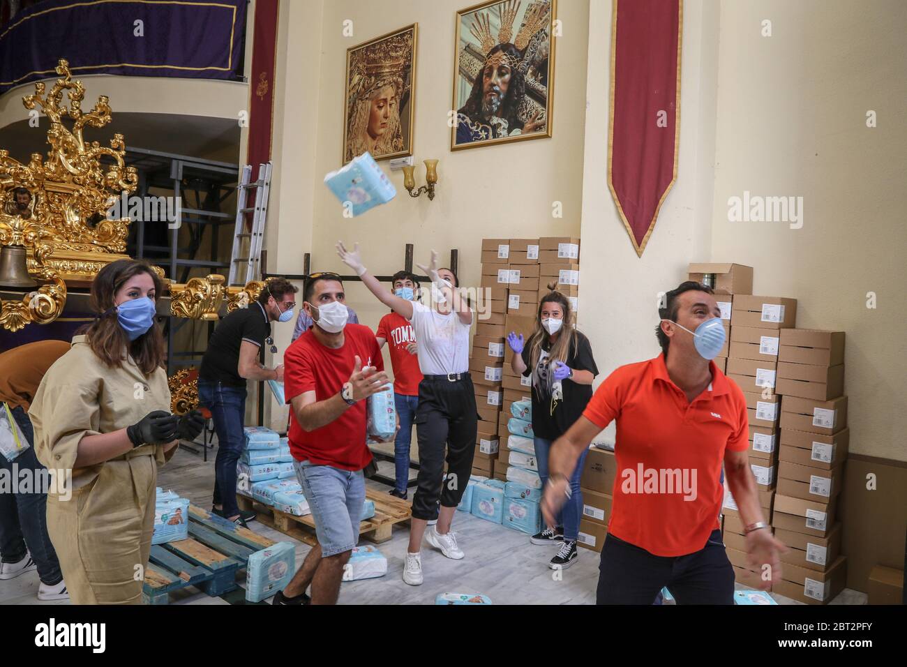 May 22, 2020: Malaga, Spain: La cofradia del Rico has raised money with its brothers for a solidarity initiative for the donation of 30,000 diapers for families in need of the coronavirus crisis Credit: Lorenzo Carnero/ZUMA Wire/Alamy Live News Stock Photo