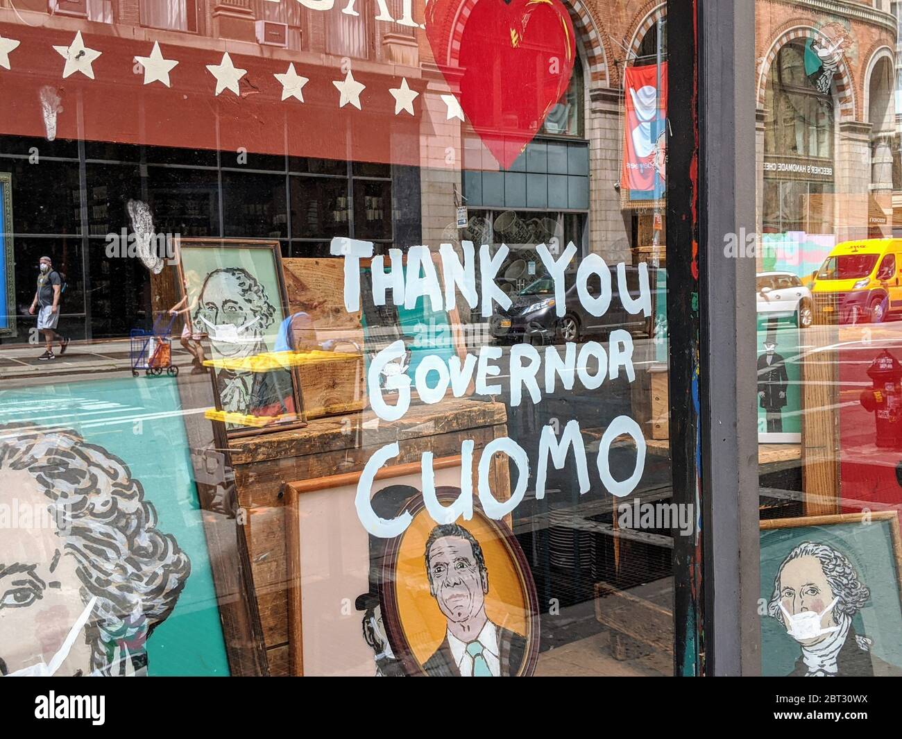 Sign in a store window thanking Governor Cuomo during the coronavirus pandemic in New York City. Stock Photo