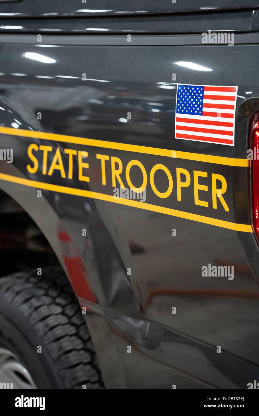 Harrisburg, PA / USA - January 8, 2020: Close up of the State Trooper ID on a Pennsylvania State Police vehicle, on display at the annual PA Farm Show Stock Photo