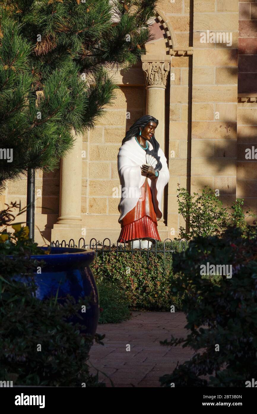 Kateri Tekakwitha statue in front of Cathedral Basilica of Saint Francis of Assisi also known as Saint Francis Cathedral in Santa Fe, New Mexico. Stock Photo
