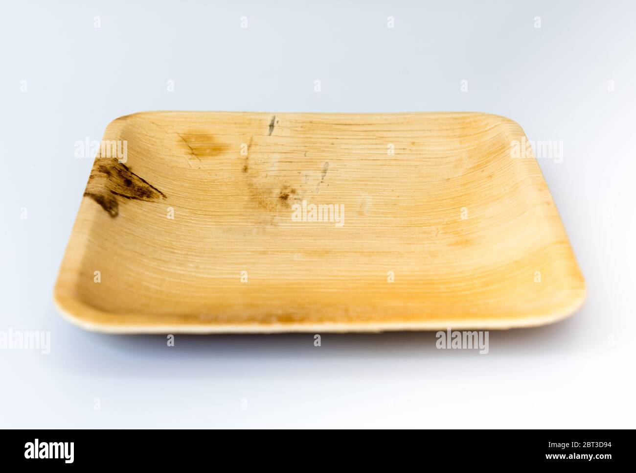 Square shaped palm leaf plate isolated on white background Stock Photo