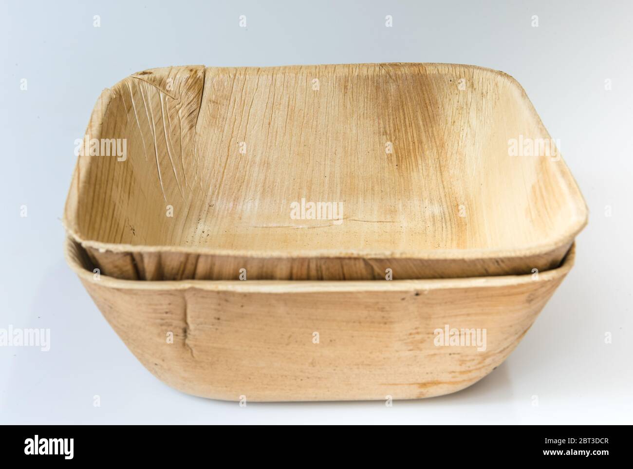 Palm leaf pressed cups isolated on white background Stock Photo