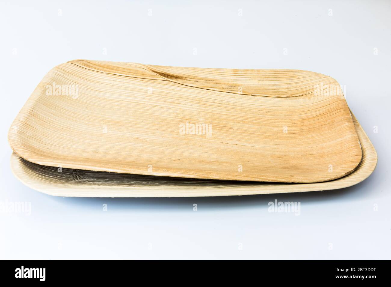 Palm leaf plates isolated on white background Stock Photo