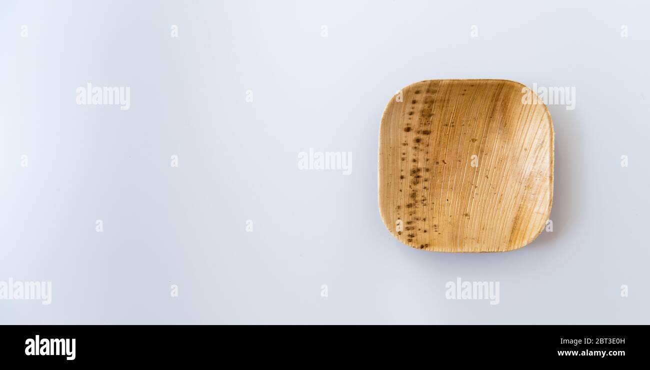 Palm leaf cup isolated on white background for banner Stock Photo