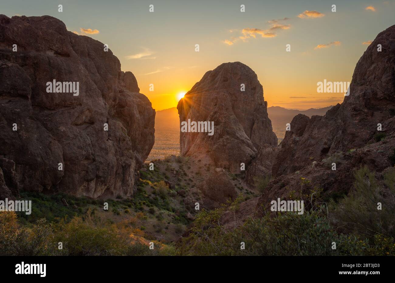 Sunset Over a Sandstone Monolith, Kofa National Wildlife Refuge, Arizona, USA Stock Photo