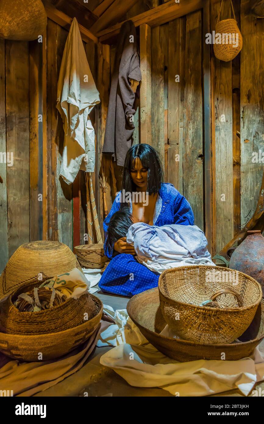 Diorama portraying Miwok life in on a summer day in the 1880s, when tradtions were blending with new European-American influences on housing and foods Stock Photo