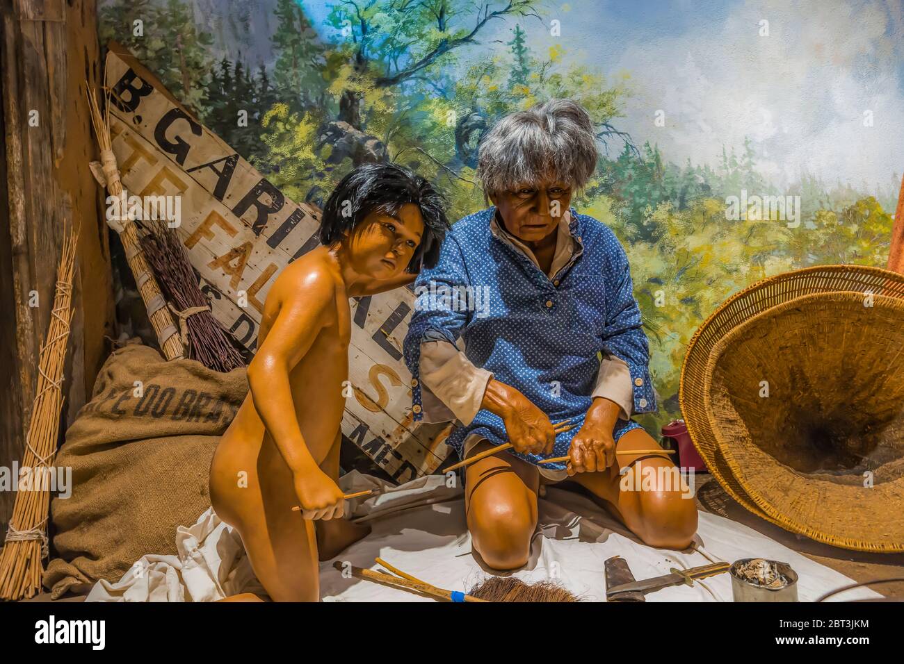 Diorama portraying Miwok life in on a summer day in the 1880s, when tradtions were blending with new European-American influences on housing and foods Stock Photo