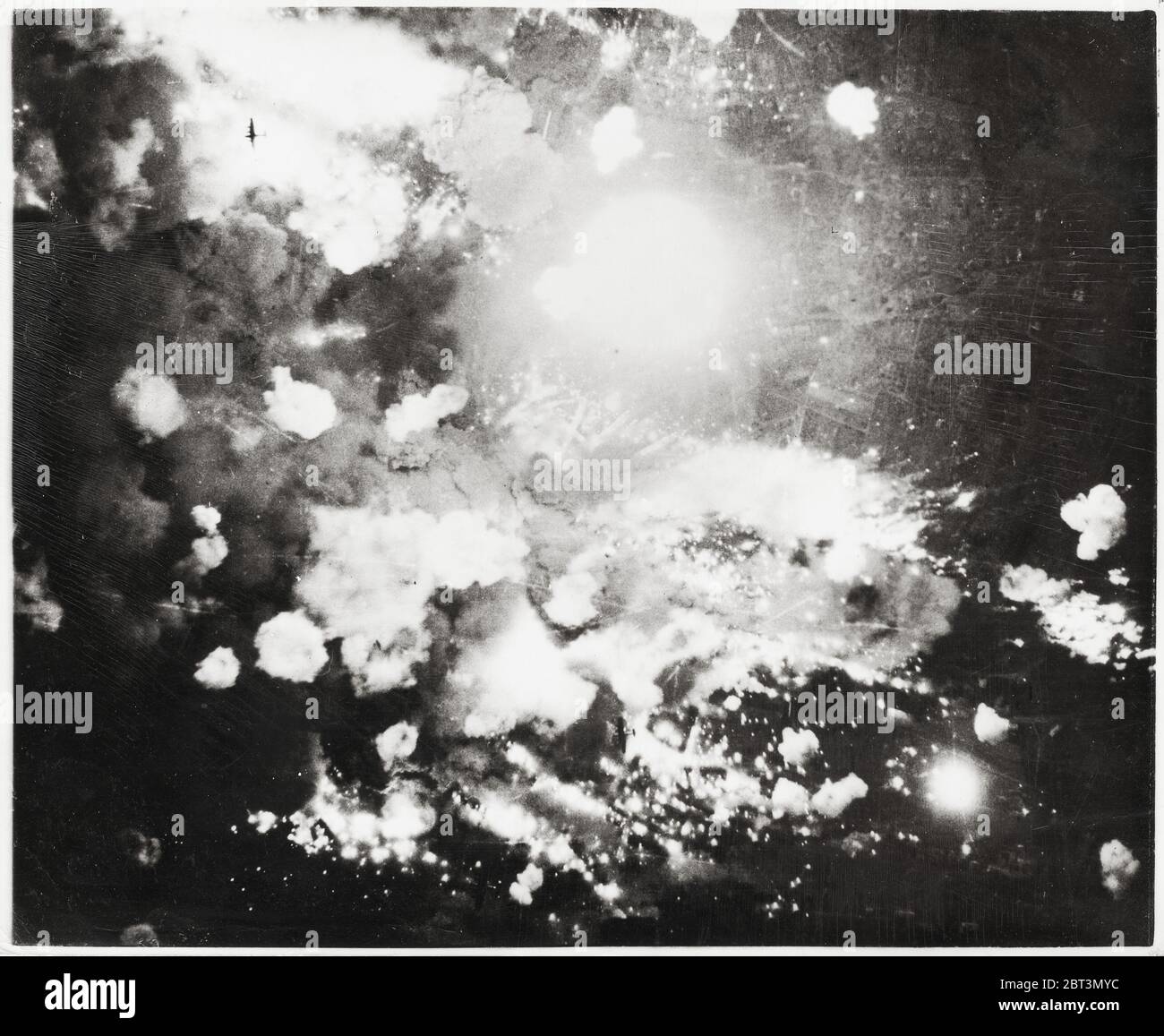 World War II vintage photograph - fires burning and bombs exploding over Pforzheim, Germany Stock Photo