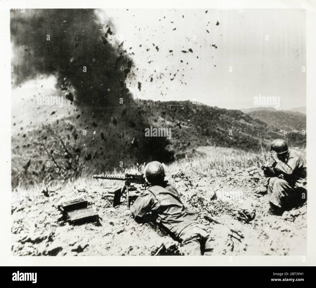 World War II vintage photograph - satchel charge against Japanese soldiers on Luzon, Philippines Stock Photo
