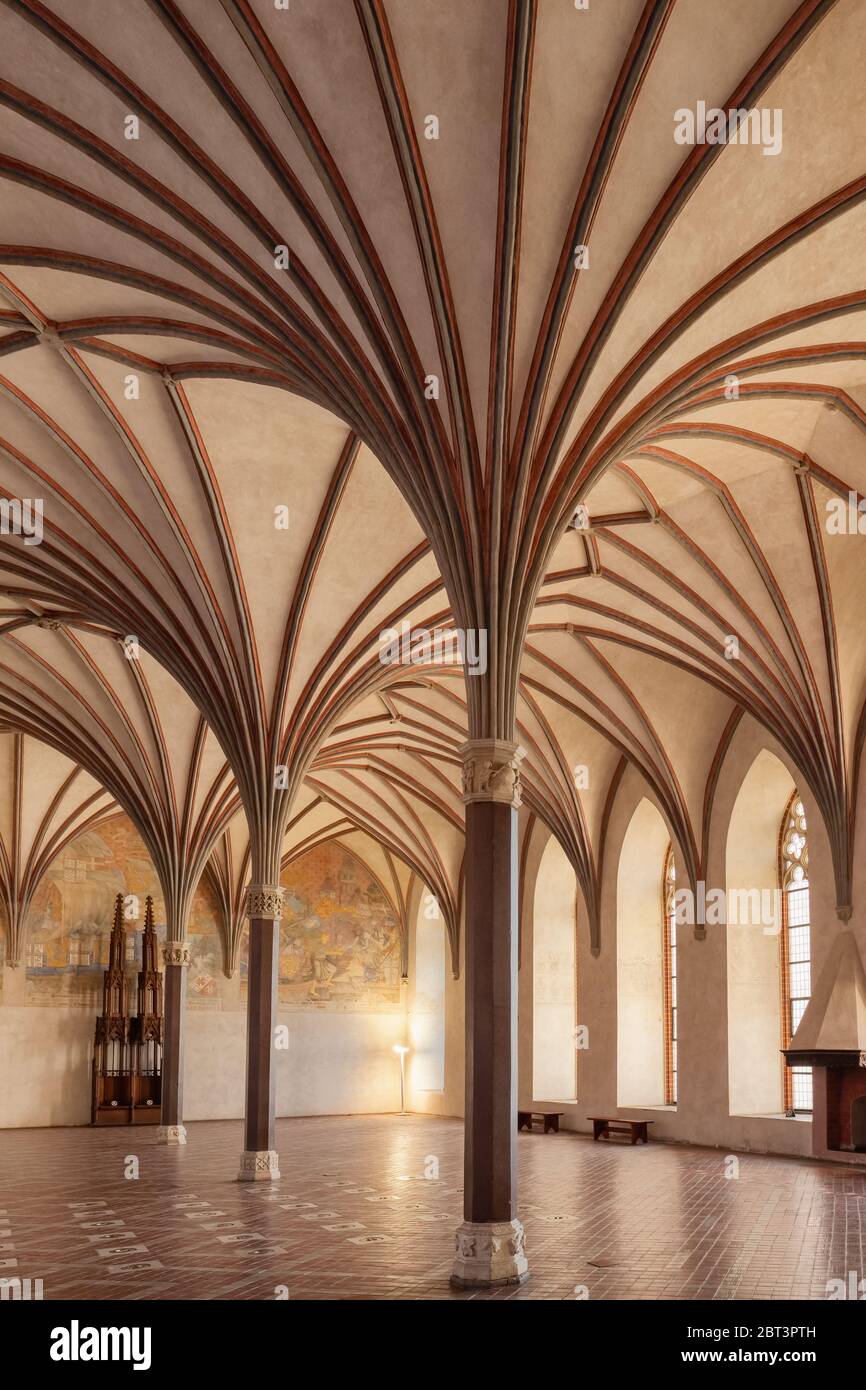 Interior of the Gothic hall of the medieval castle in Malbork, Poland Stock Photo