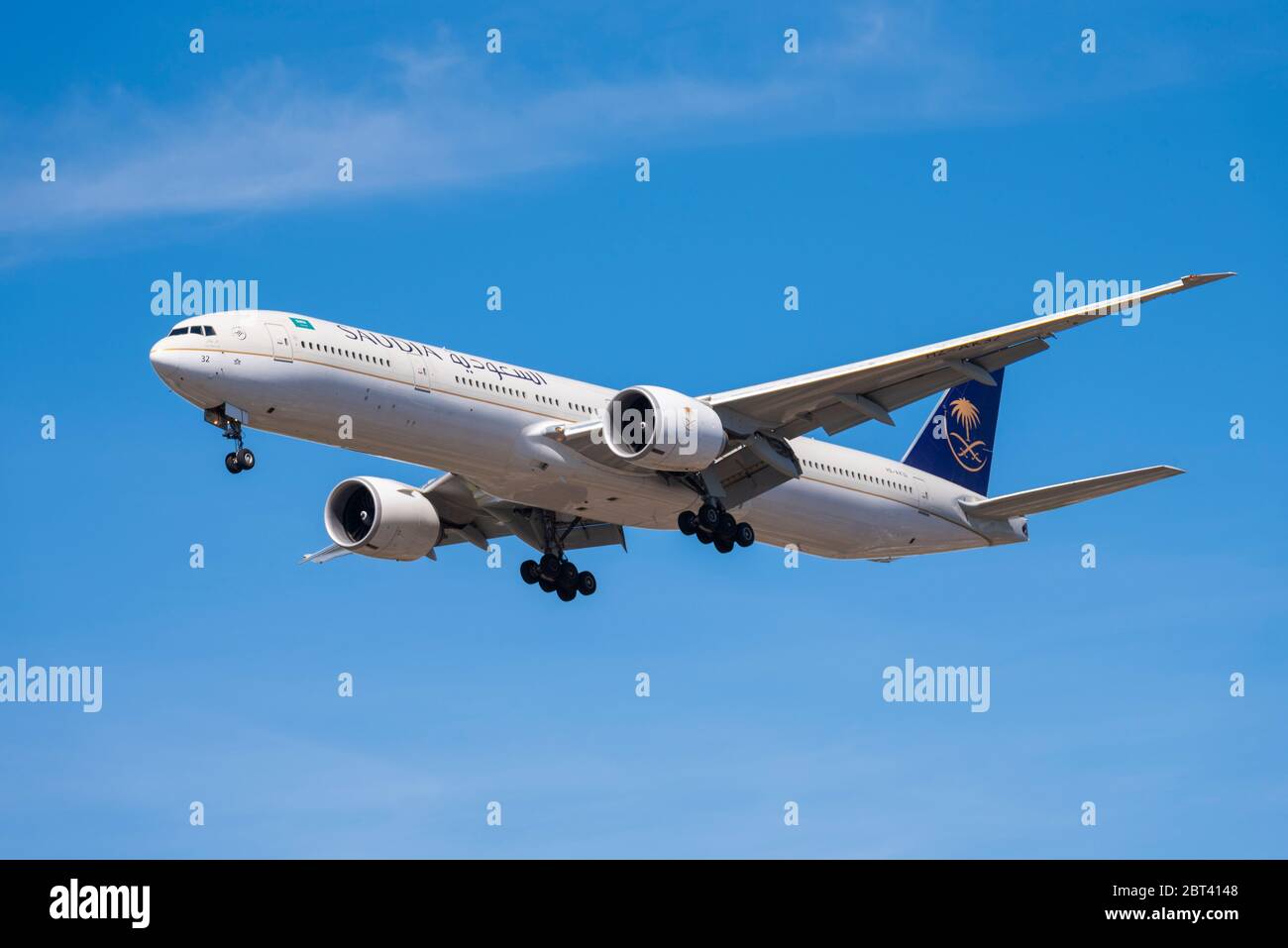 Saudia Boeing 777 jet airliner plane landing at London Heathrow Airport