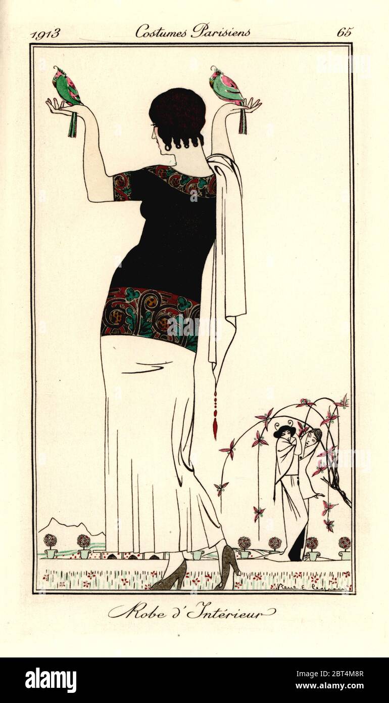 Woman in short-sleeved top with embroidered trim and white skirt and stole holding two birds aloft. Robe dinterieur. Handcoloured pochoir (stencil) etching after an illustration by Pierre Legrain from Tommaso Antonginis Journal des Dames et des Modes, Aux Bureaux du Journal des Dames, Paris, 1913. Stock Photo