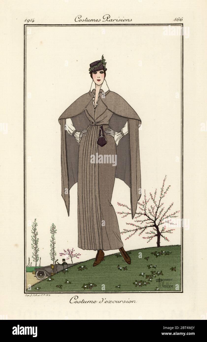 Woman in travel outfit in front of cherry blossom trees. Costume dexcursion. Handcoloured pochoir (stencil) etching after an illustration by Armand Vallee from Tommaso Antonginis Journal des Dames et des Modes, Aux Bureaux du Journal des Dames, Paris, 1914. Stock Photo