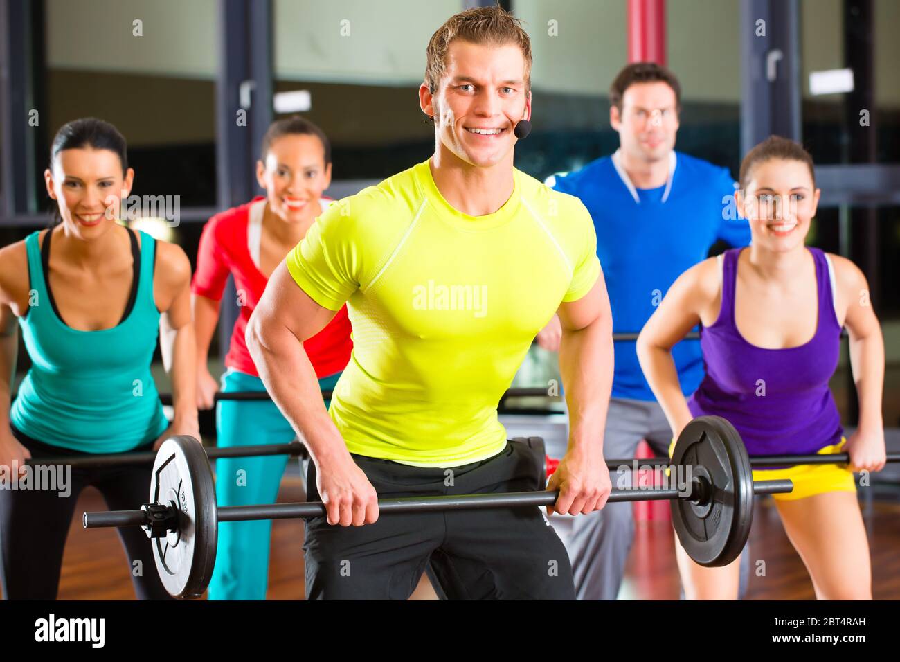 group with weight training in the gym Stock Photo - Alamy