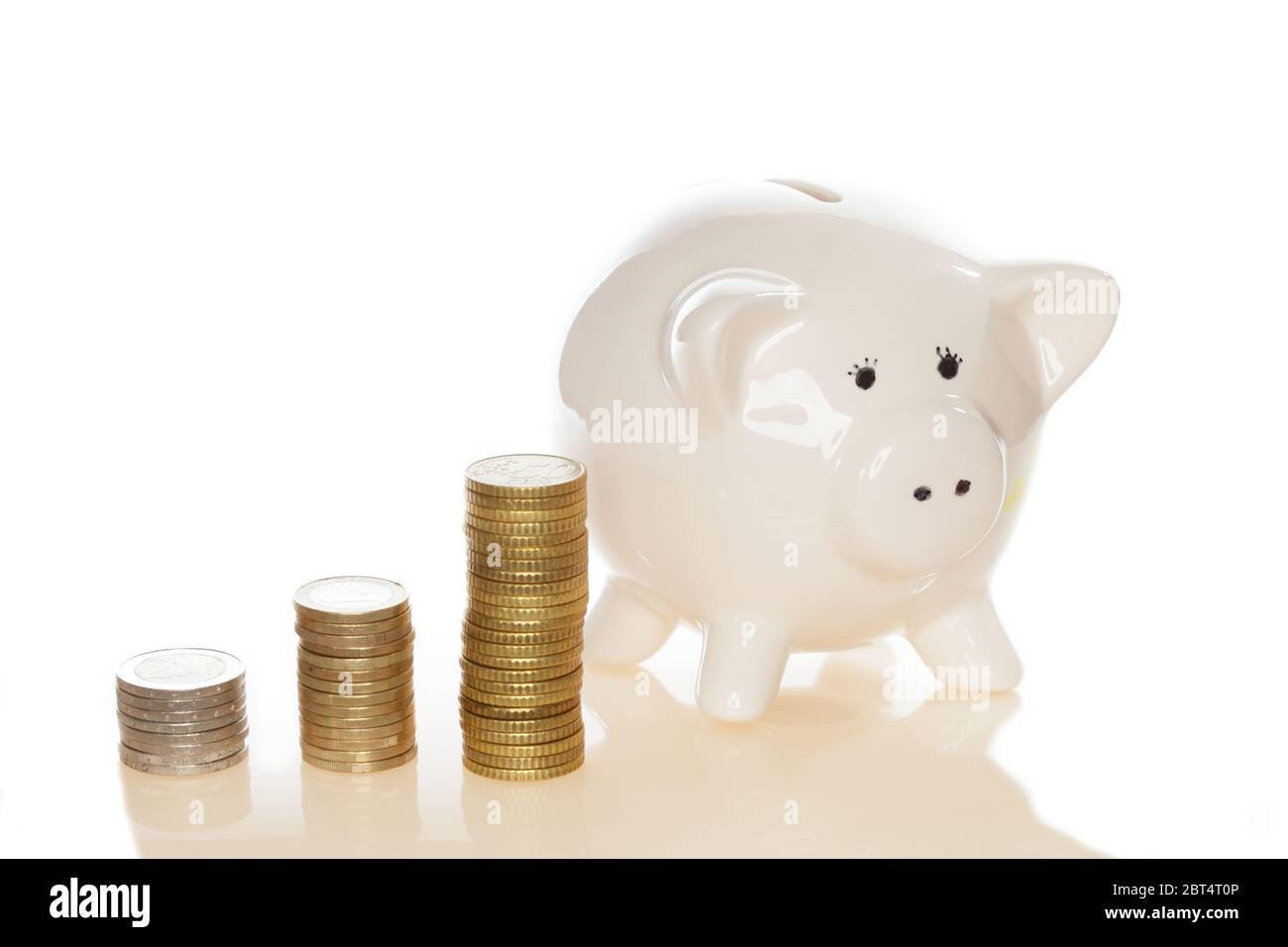 coins and piggy bank Stock Photo