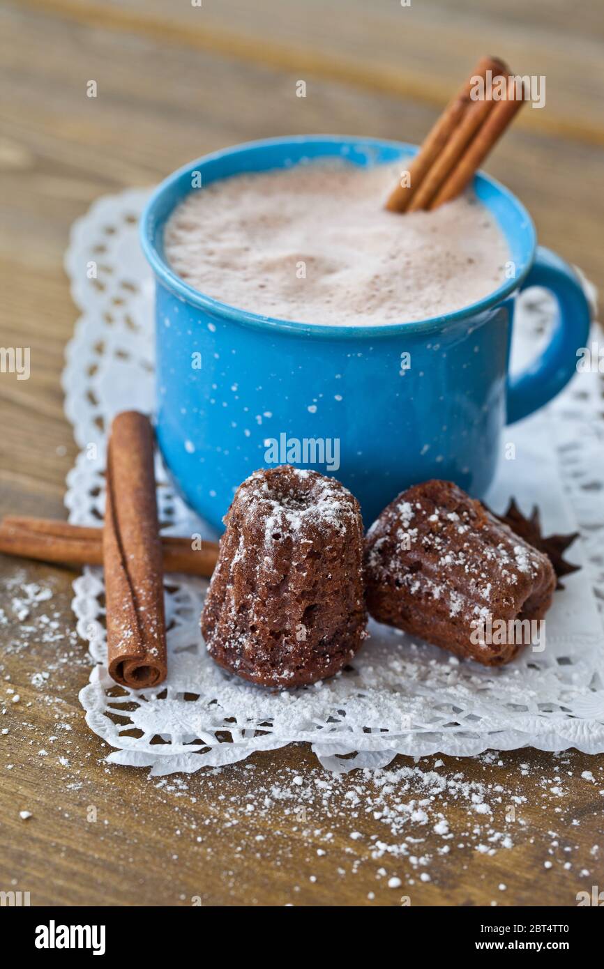 hot cocoa with small chocolate cake Stock Photo